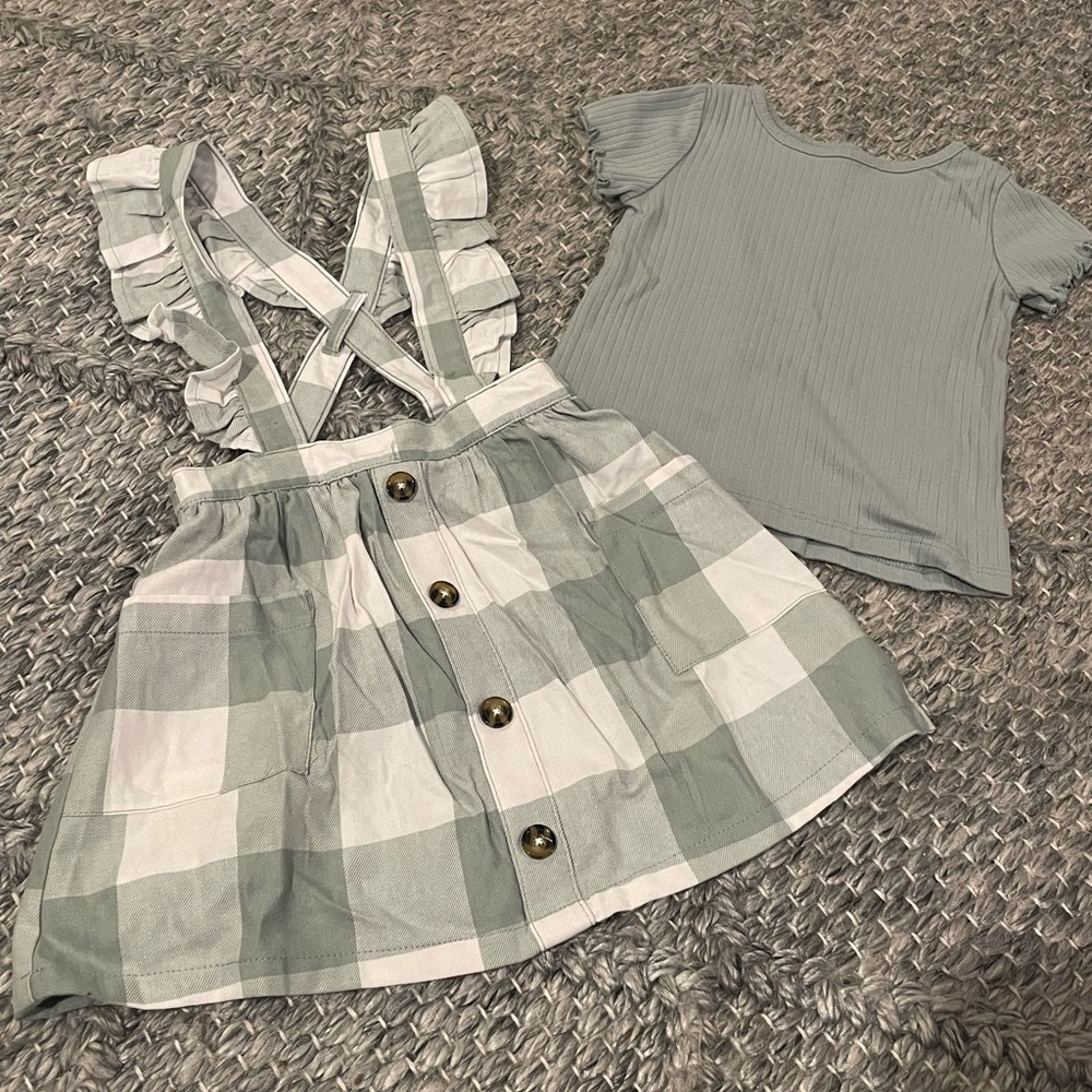 Two piece skirt and shirt set. Size 2T
